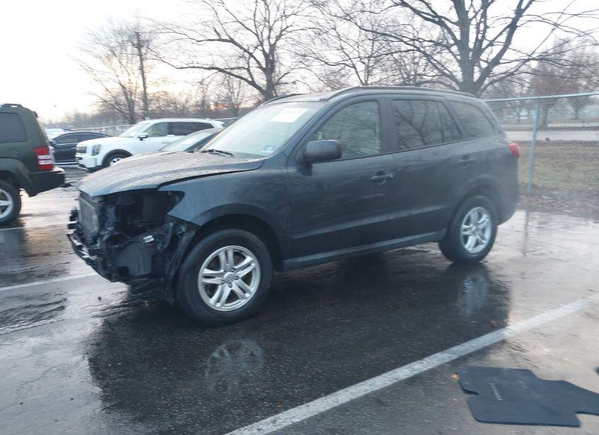 Photo 2 of 2012 Hyundai Santa FE GLS (VIN 5XYZGDAB9CG145045)