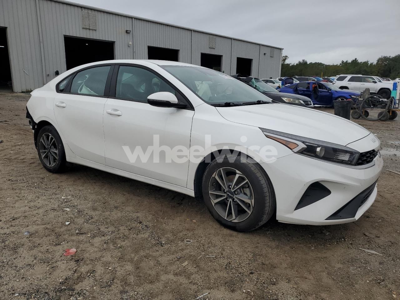 Photo 4 of 2023 KIA FORTE LX (VIN 5Y2SL63865Z447861)