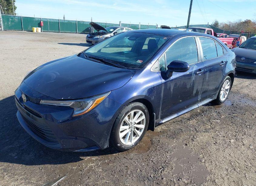 Photo 2 of 2023 Toyota Corolla LE (VIN 5YFB4MDE4PP077710)