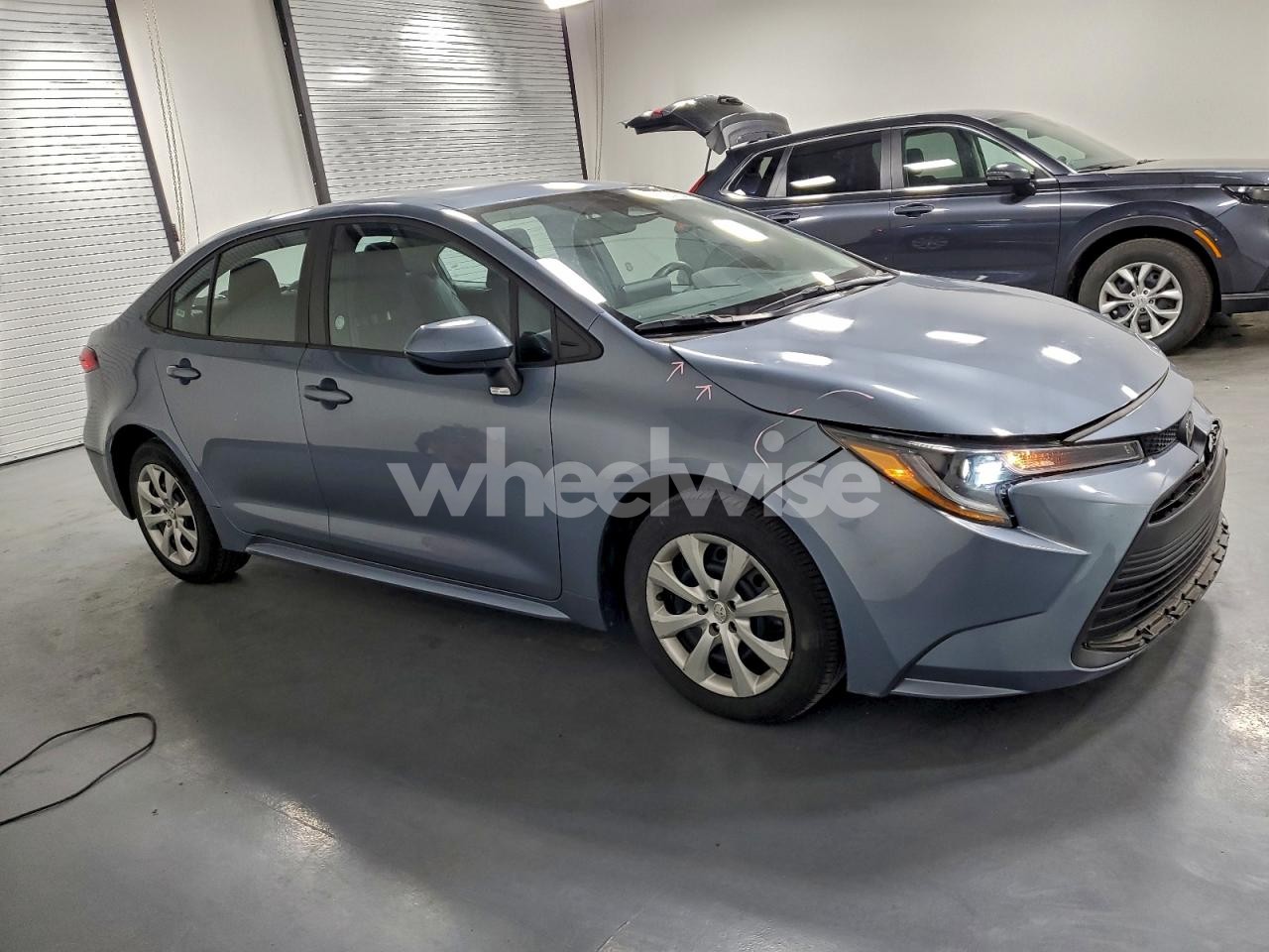 Photo 4 of 2023 TOYOTA COROLLA LE (VIN 5YFB4MDE7PP062991)