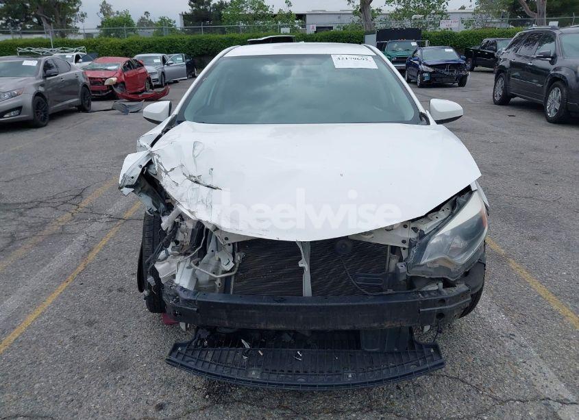 Photo 11 of 2016 Toyota Corolla L (VIN 5YFBURHE0GP392074)