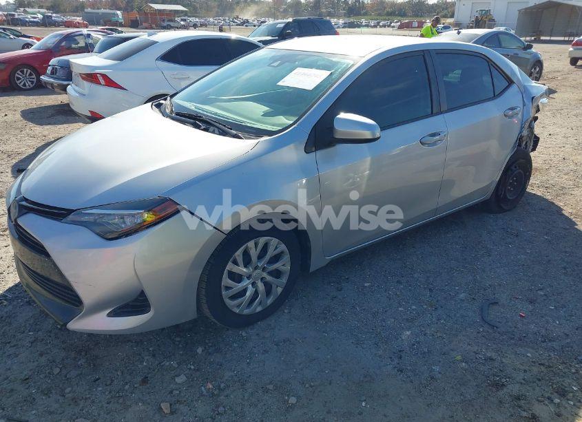 Photo 2 of 2017 Toyota Corolla LE (VIN 5YFBURHE0HP597024)