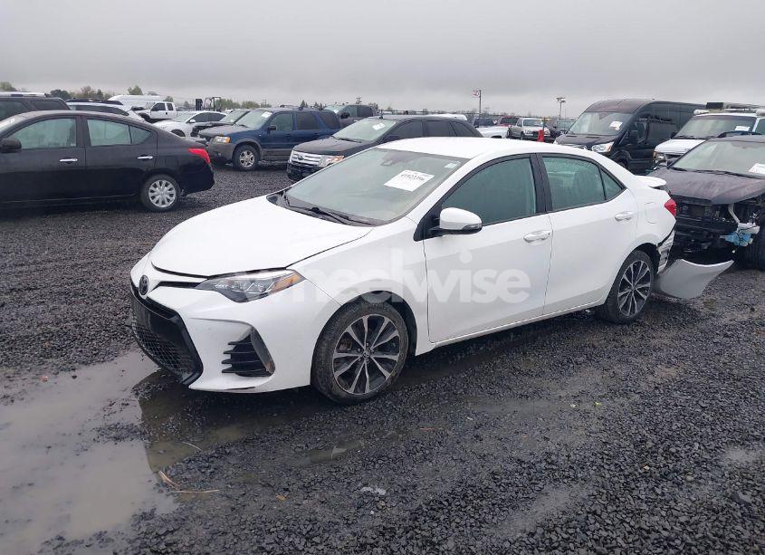 Photo 2 of 2017 Toyota Corolla SE (VIN 5YFBURHE0HP602402)
