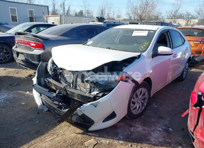 Photo 2 of 2017 Toyota Corolla LE (VIN 5YFBURHE0HP617594)