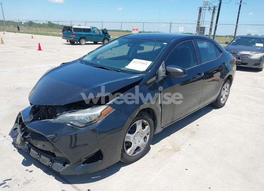 Photo 2 of 2017 Toyota Corolla LE (VIN 5YFBURHE0HP617658)