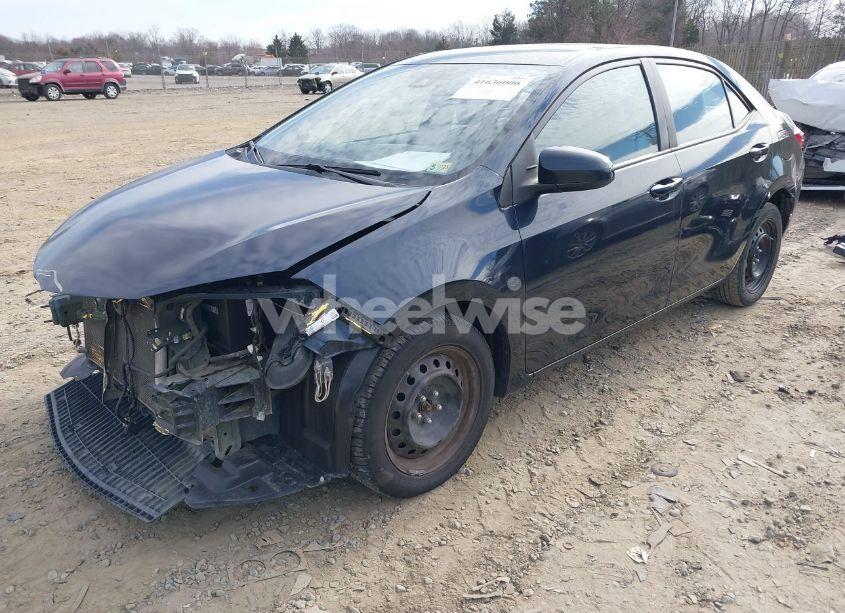 Photo 2 of 2017 Toyota Corolla LE (VIN 5YFBURHE0HP673048)