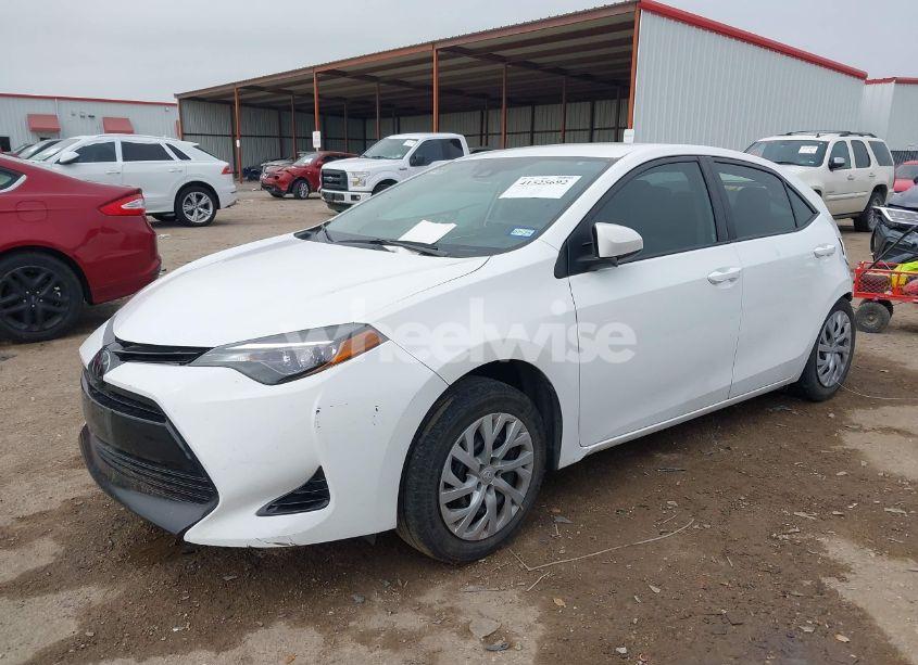 Photo 2 of 2017 Toyota Corolla LE (VIN 5YFBURHE0HP674460)