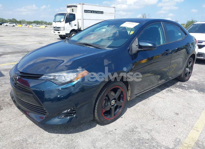 Photo 2 of 2017 Toyota Corolla LE (VIN 5YFBURHE0HP736293)