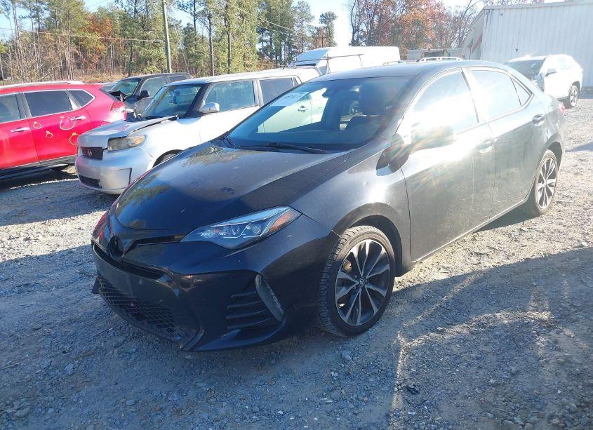 Photo 2 of 2017 Toyota Corolla SE (VIN 5YFBURHE1HP594665)