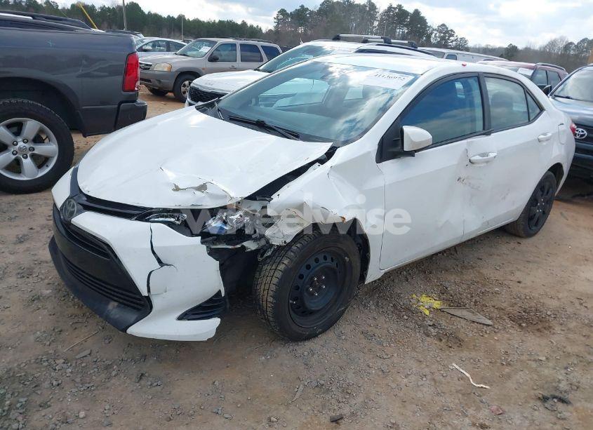 Photo 2 of 2017 Toyota Corolla LE (VIN 5YFBURHE1HP600125)