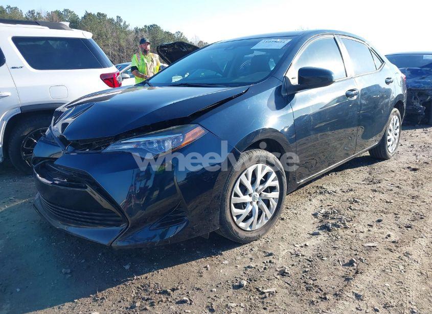 Photo 2 of 2017 Toyota Corolla LE (VIN 5YFBURHE1HP722550)