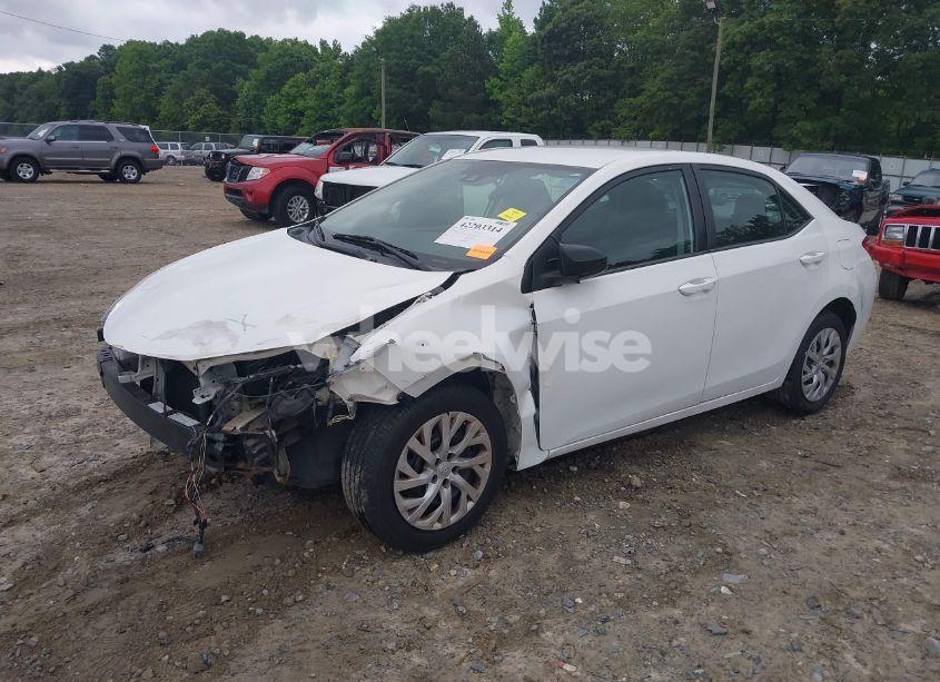 Photo 2 of 2017 Toyota Corolla LE (VIN 5YFBURHE1HP724007)