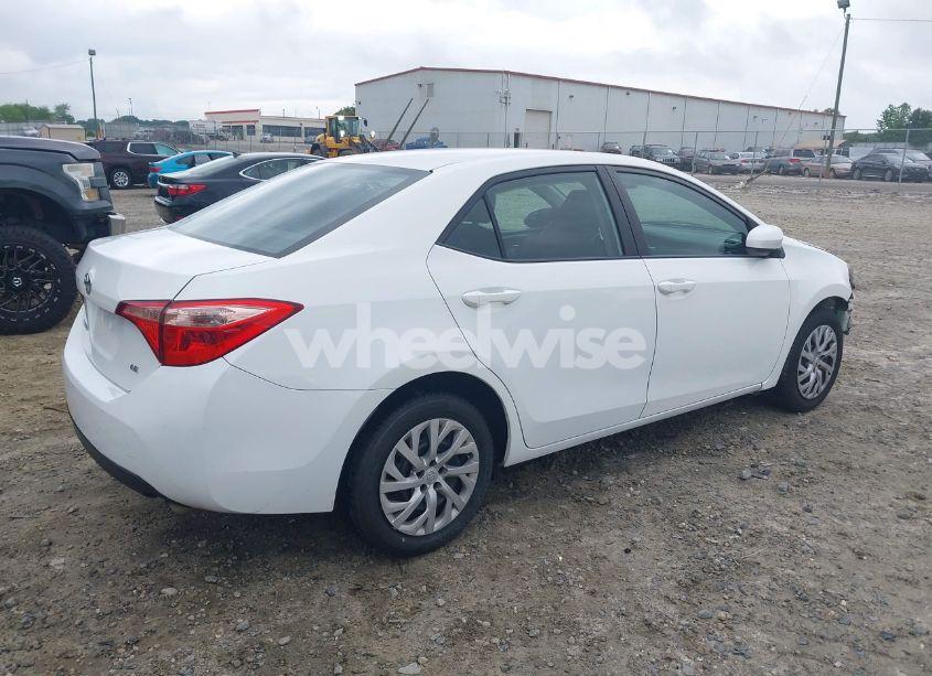 Photo 4 of 2017 Toyota Corolla LE (VIN 5YFBURHE1HP724007)