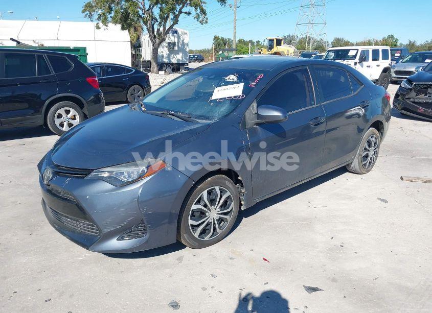 Photo 2 of 2017 Toyota Corolla LE (VIN 5YFBURHE1HP732897)