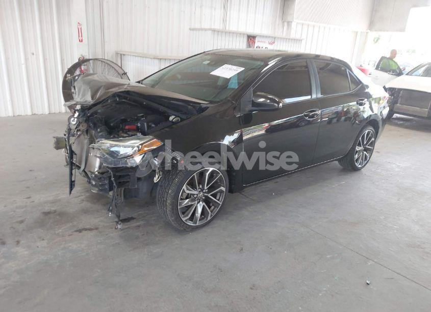 Photo 2 of 2018 Toyota Corolla LE (VIN 5YFBURHE1JP773892)