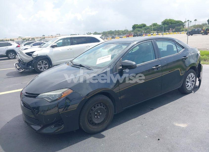 Photo 2 of 2018 Toyota Corolla LE (VIN 5YFBURHE1JP793513)