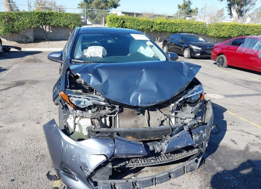 Photo 12 of 2018 Toyota Corolla LE (VIN 5YFBURHE1JP795312)