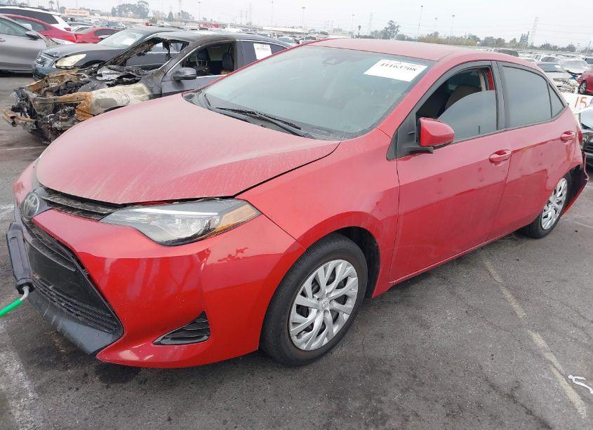 Photo 2 of 2018 Toyota Corolla LE (VIN 5YFBURHE1JP809953)