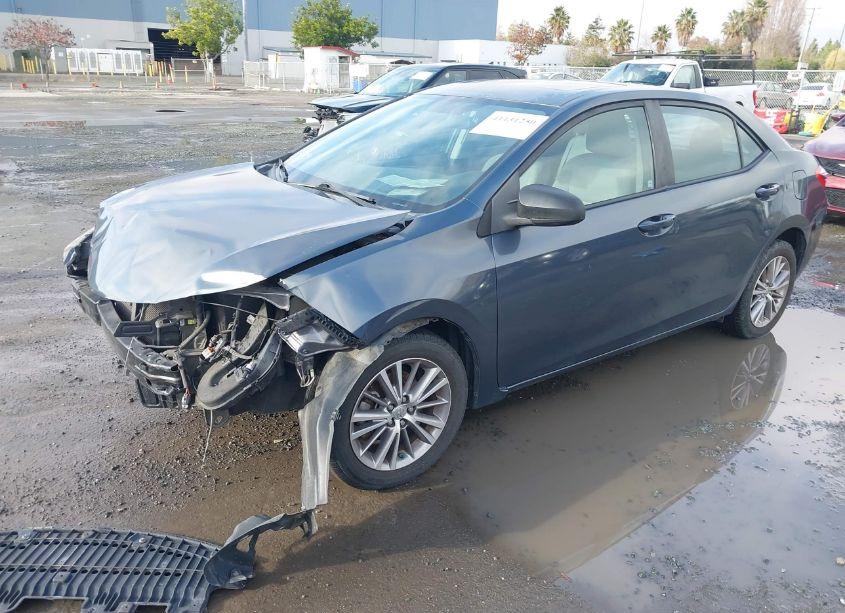 Photo 2 of 2014 Toyota Corolla L/LE/LE PLS/PRM/S/S PLS (VIN 5YFBURHE2EP002802)