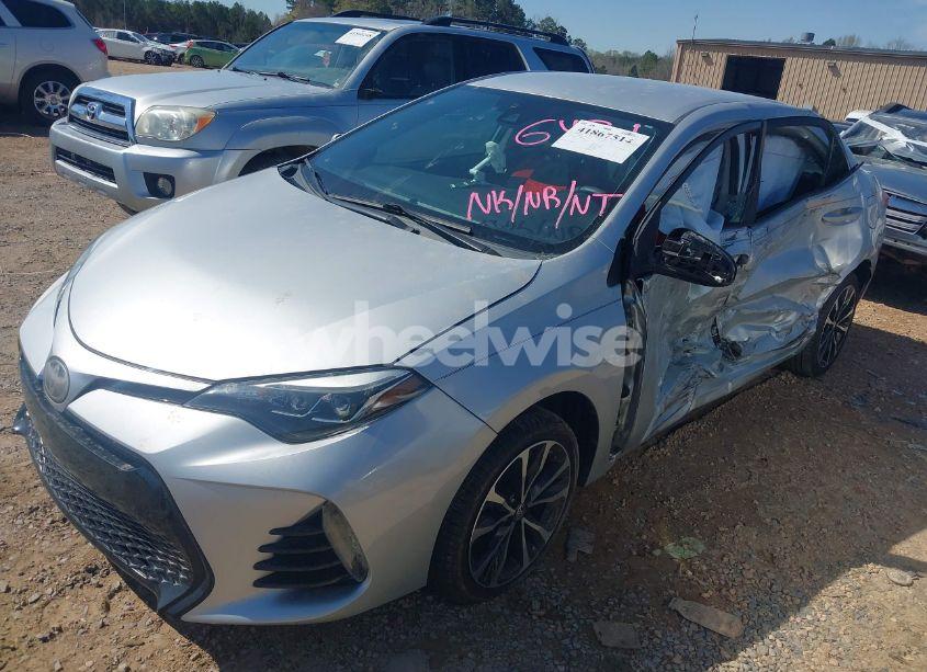 Photo 2 of 2017 Toyota Corolla SE (VIN 5YFBURHE2HP656431)