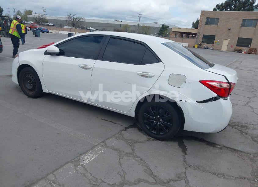 Photo 3 of 2017 Toyota Corolla LE (VIN 5YFBURHE2HP678669)