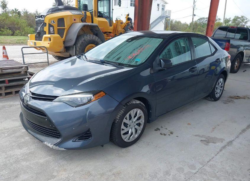 Photo 2 of 2017 Toyota Corolla LE (VIN 5YFBURHE2HP690143)