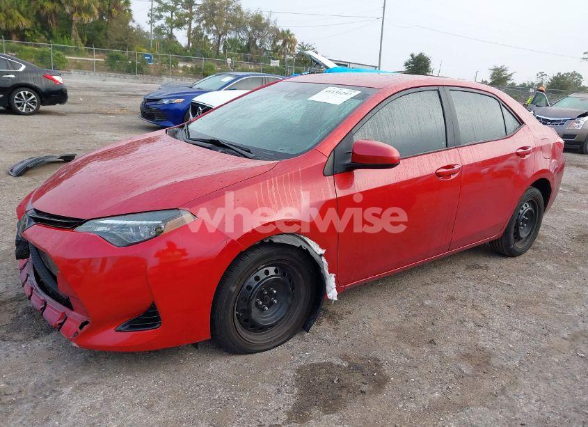 Photo 2 of 2017 Toyota Corolla LE (VIN 5YFBURHE2HP692023)