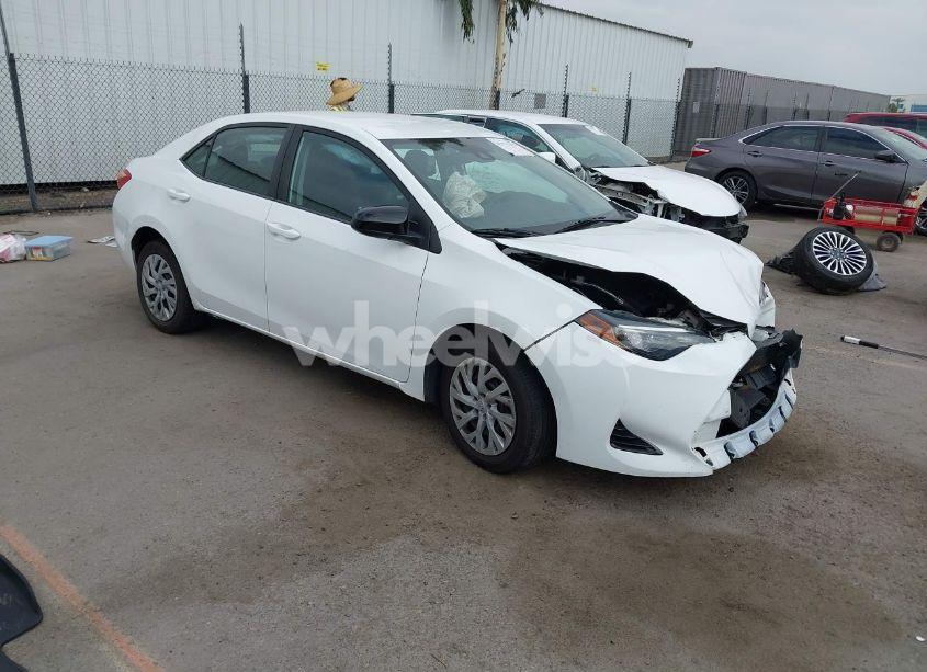 2017 Toyota Corolla LE (VIN 5YFBURHE2HP703702) main photo