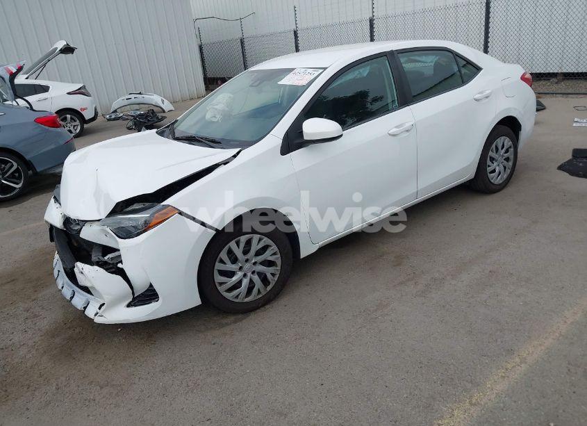 Photo 2 of 2017 Toyota Corolla LE (VIN 5YFBURHE2HP703702)