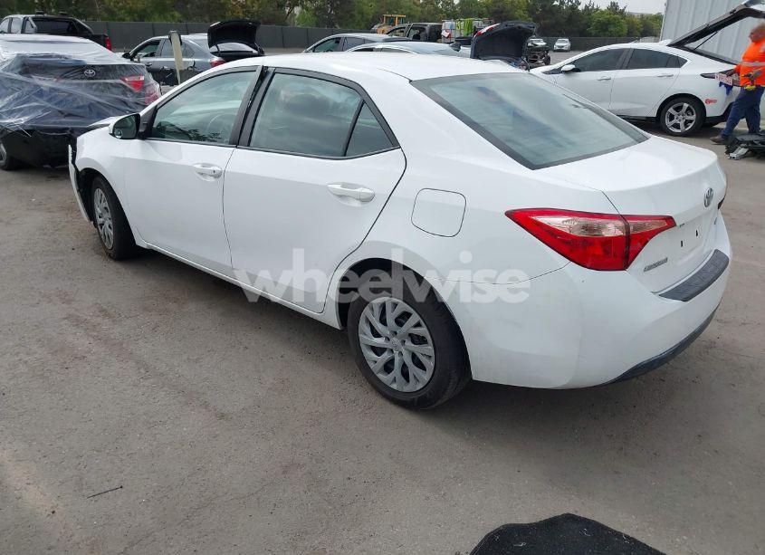 Photo 3 of 2017 Toyota Corolla LE (VIN 5YFBURHE2HP703702)