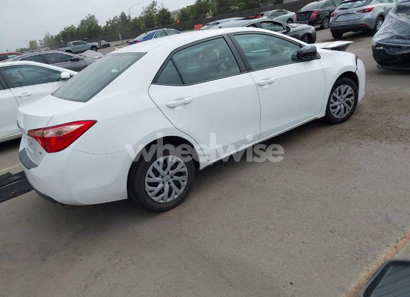 Photo 4 of 2017 Toyota Corolla LE (VIN 5YFBURHE2HP703702)