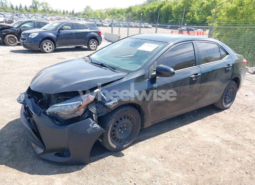 Photo 2 of 2017 Toyota Corolla LE (VIN 5YFBURHE2HP707099)