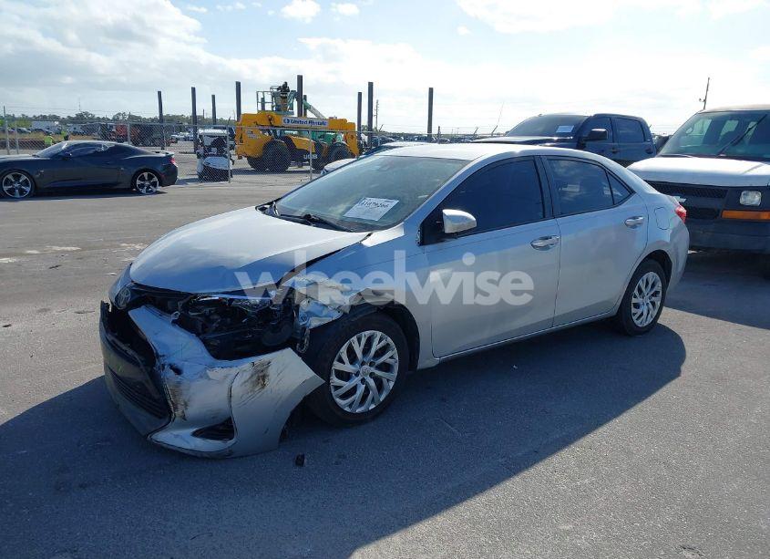 Photo 2 of 2017 Toyota Corolla LE (VIN 5YFBURHE2HP727577)