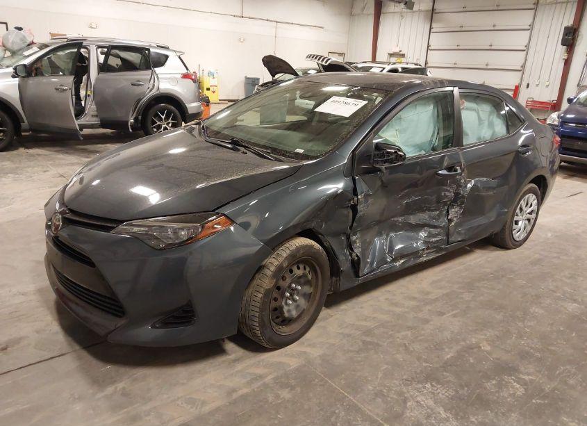 Photo 2 of 2017 Toyota Corolla LE (VIN 5YFBURHE2HP730043)