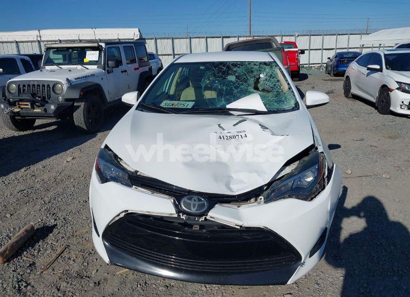 Photo 12 of 2017 Toyota Corolla LE (VIN 5YFBURHE2HP734108)
