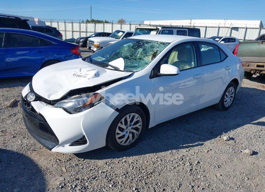 Photo 2 of 2017 Toyota Corolla LE (VIN 5YFBURHE2HP734108)
