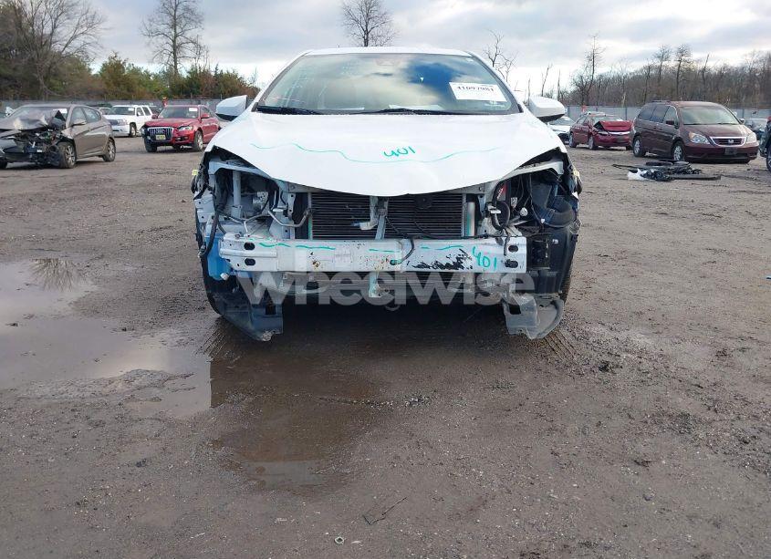 Photo 6 of 2017 Toyota Corolla LE (VIN 5YFBURHE2HP736649)