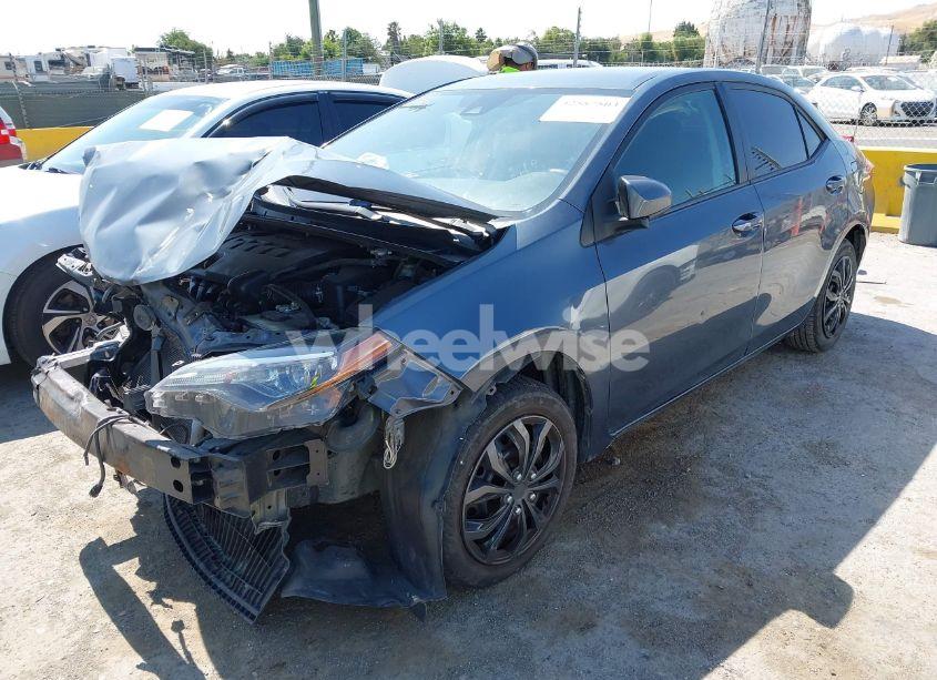 Photo 2 of 2018 Toyota Corolla LE (VIN 5YFBURHE2JP826065)