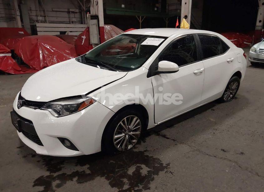 Photo 2 of 2014 Toyota Corolla LE PLUS (VIN 5YFBURHE3EP043262)
