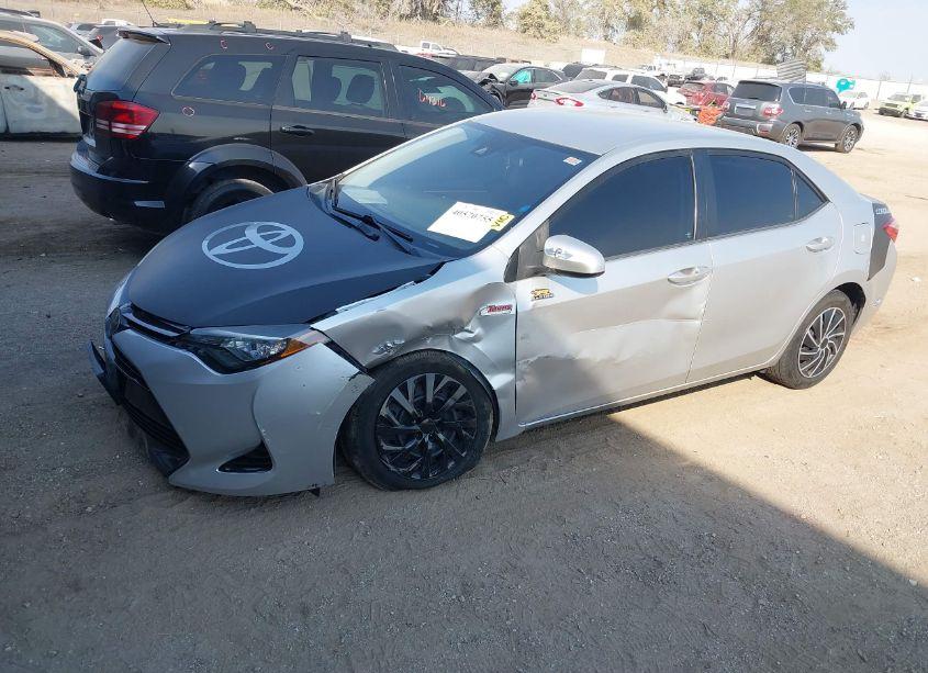 Photo 2 of 2017 Toyota Corolla LE (VIN 5YFBURHE3HP589371)