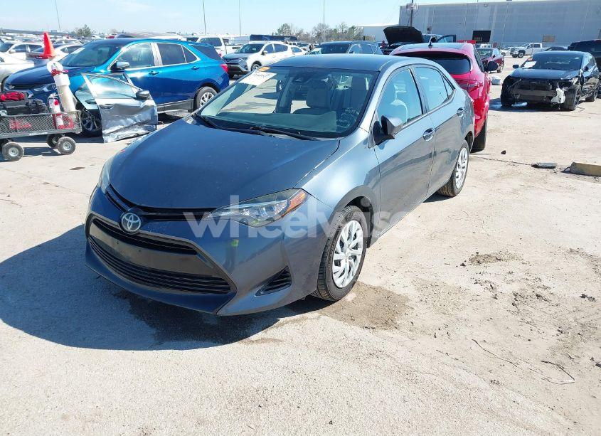 Photo 2 of 2017 Toyota Corolla LE (VIN 5YFBURHE3HP607903)