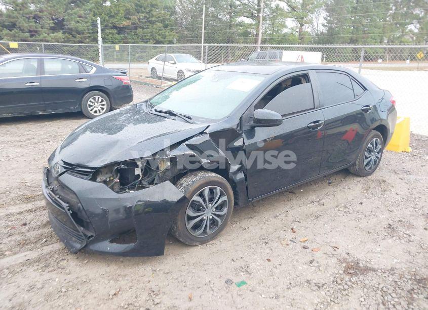 Photo 2 of 2017 Toyota Corolla LE (VIN 5YFBURHE3HP658835)