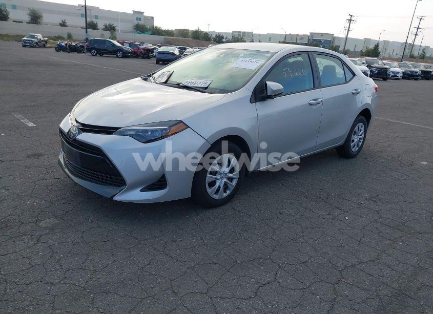 Photo 2 of 2017 Toyota Corolla L (VIN 5YFBURHE3HP666479)