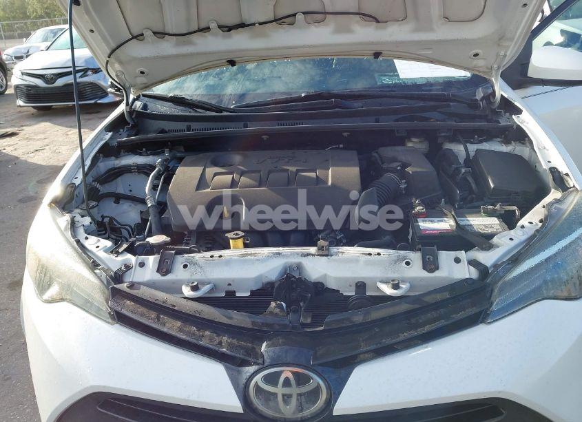 Photo 10 of 2017 Toyota Corolla LE (VIN 5YFBURHE3HP709833)