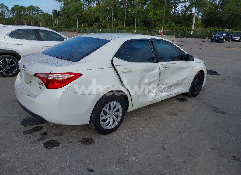Photo 4 of 2017 Toyota Corolla LE (VIN 5YFBURHE3HP709833)