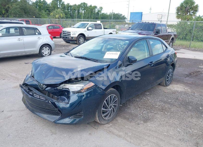 Photo 2 of 2017 Toyota Corolla LE (VIN 5YFBURHE3HP735994)