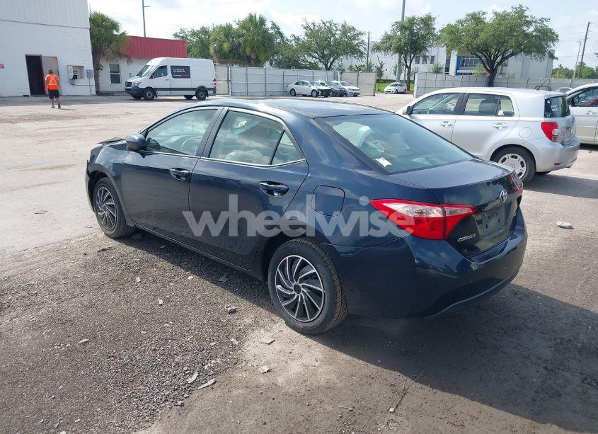 Photo 3 of 2017 Toyota Corolla LE (VIN 5YFBURHE3HP735994)