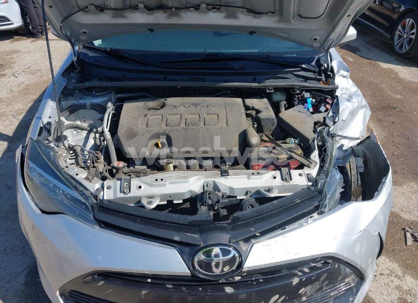 Photo 10 of 2018 Toyota Corolla LE (VIN 5YFBURHE3JP827077)