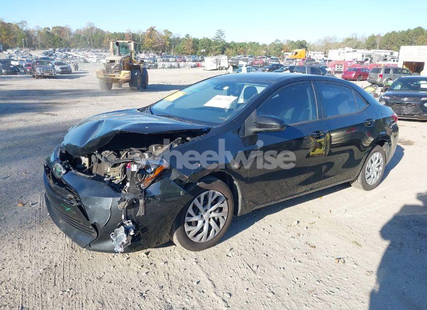 Photo 2 of 2019 Toyota Corolla LE (VIN 5YFBURHE3KP877690)
