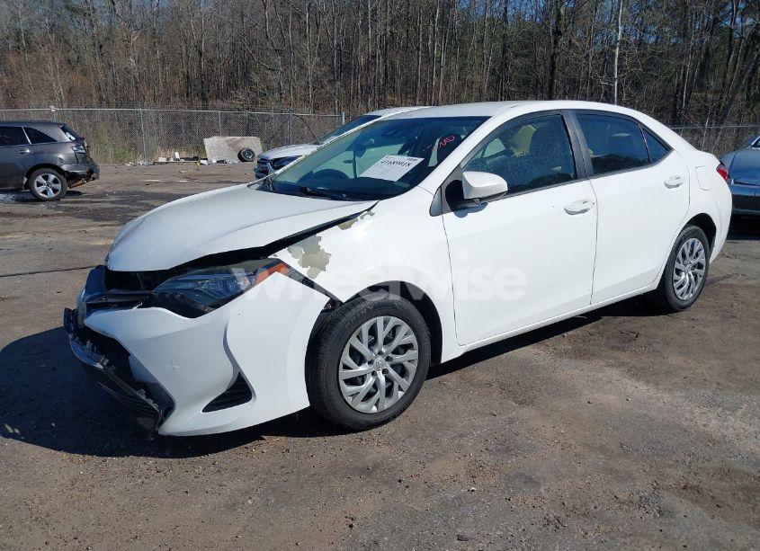 Photo 2 of 2017 Toyota Corolla LE (VIN 5YFBURHE4HP580792)